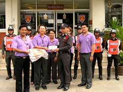Siam Commercial Bank presents reflective safety vests to police